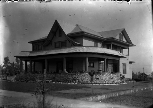 Upland Photograph Houses; Herman Eymann home, showing wrap-around veranda / Edna Swan