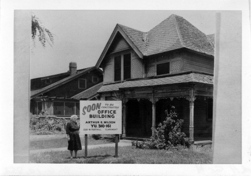 Upland Photograph Houses; John Gerry home, Eva Gerry Moore in the front yard with a for sale sign / Esther Boulton Black Estate