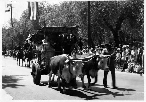 Upland Photograph Events; Parade for the First Anniversary of the unveiling of the Madonna of the Trail Statue February 1930 / Charles E. Bowser