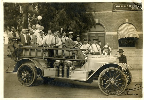 Upland Photograph Upland Fire Department Truck and Crew at Commercial National Bank in Uplands' first fire truck