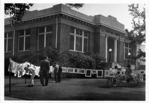 Upland Photograph Public Services; Upland Public Library (Carnegie) front lawn art exhibit