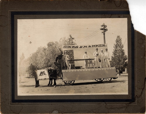 Upland Photograph Events; Parade: float pulled by two horses advertising Sikes and Manker painting