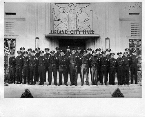 Upland Photograph Public Services; Upland Police Department: regular and reserve police officers standing at the entrance to Upland City Hall