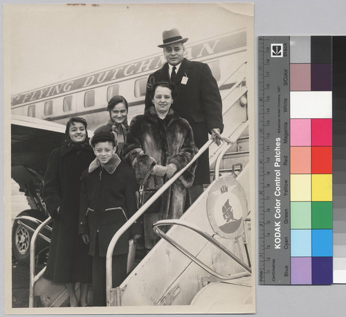 Ralph J. Bunche and family disembarking KLM flight