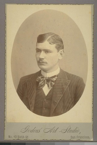 [Portrait of unidentified man. Photograph by John David Godeus.]