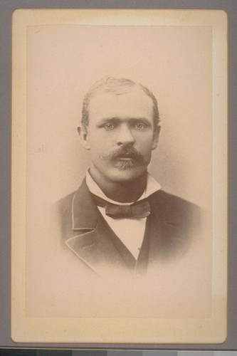 [Portrait of unidentified man. Photograph by James G. Smith.]