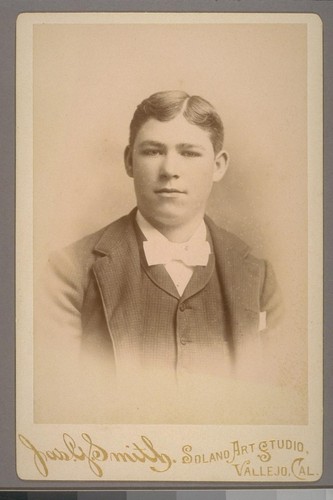 [Portrait of unidentified man. Photograph by James G. Smith.]