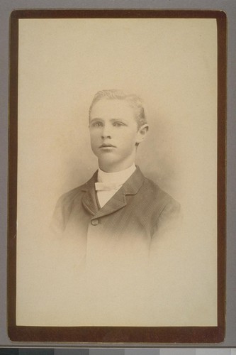 [Portrait of unidentified boy. Photograph by James G. Smith.]