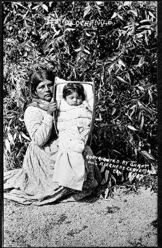 Pomo woman and baby in basket, Cloverdale, California, 1907