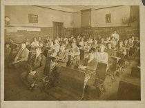 Summit School classroom with teacher in back, 1910