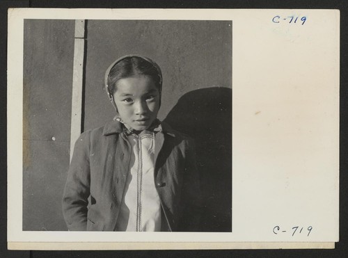 Manzanar, Calif.--A young evacuee of Japanese ancestry at this War Relocation Authority center. Photographer: [Lange, Dorothea?] Manzanar, California