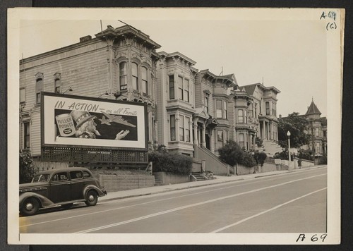 While American troops were going in action on far-flung fronts, residents of Japanese ancestry were being evacuated from this neighborhood on Post Street. Evacuees will be housed in War Relocation Authority centers for duration. Photographer: Lange, Dorothea San Francisco, California