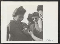 A group of girls who are residents at this center and a puppy at a football game. Photographer: Parker, Tom McGehee, Arkansas