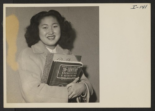 16-year-old Yoko Sato represents a typical Heart Mountain High School student. Before evacuation, Yoko lived in Sacramento, California, where she attended The Grant Union High School. Photographer: Iwasaki, Hikaru Heart Mountain, Wyoming