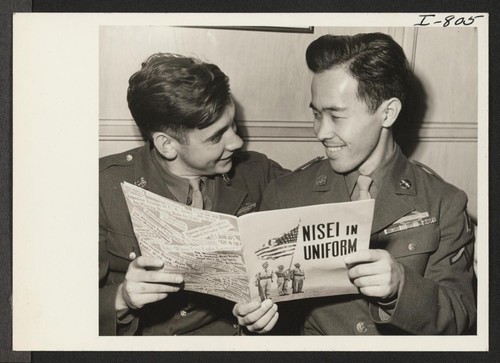 Pfc. Noboru Hokame, Hawaiian-born Japanese-American, and his Chicago buddy, Pfc. Charles P. Carroll, spent their convalescent furlough together recently at