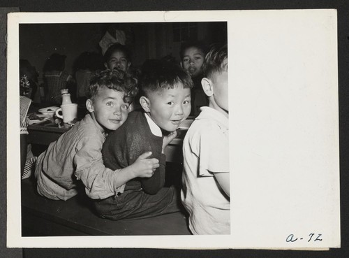 Lunch hour at the Raphael Weill Public School, Geary and Buchanan Streets, in the so-called international section. Many children of