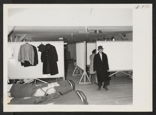 Recreation Hall in which movable screens were set up to provide bedrooms for Tule Lake transferees due to a temporary shortage of regular barrack space. Hunt, Idaho