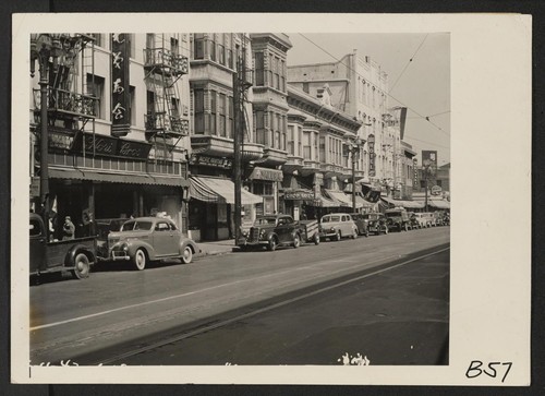 Los Angeles, Calif.--Street scene in Little Tokyo near the Los Angeles Civic Center, prior to evacuation of residents of Japanese ancestry. Evacuees will be assigned to War Relocation Authority centers for the duration. Photographer: Albers, Clem Los Angeles, California