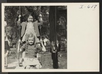 Virginia Okubo is shown playing with her schoolmates in the playground of the St. Peter Lutheran School in Arlington Heights