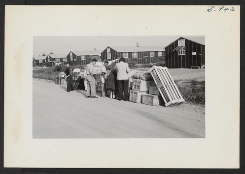 Receiving tags and check stubs for checkable baggages bound for Tule Lake. Photographer: Lynn, Charles R. Dermott, Arkansas