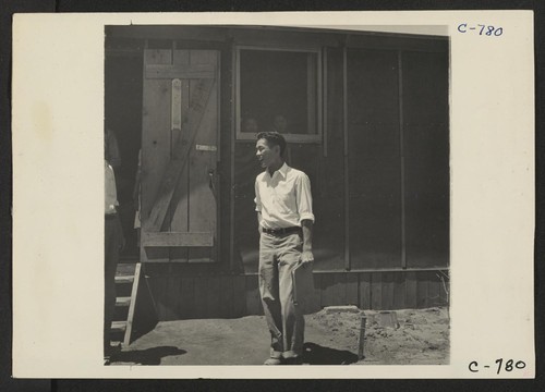 Manzanar, Calif.--Evacuee of Japanese ancestry at this War Relocation Authority center. Photographer: Lange, Dorothea Manzanar, California