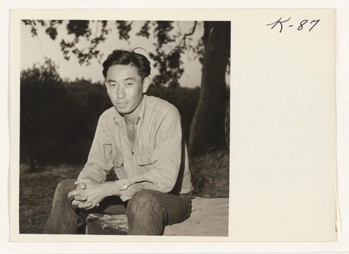 Veteran of three years service in the United States Army, Isamu Oka, shown here on the Oka orchard near Los