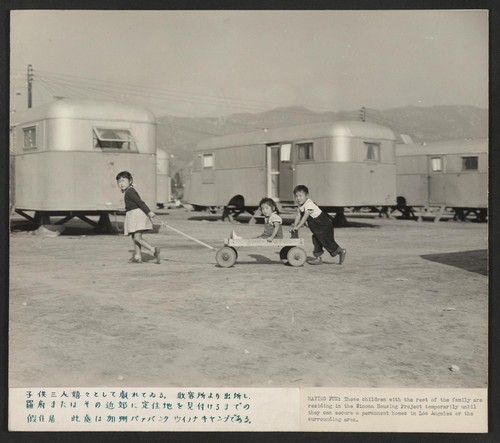 Three children, temporarily residing in the Winona Housing Project at Burbank, California, where evacuees from the centers are temporarily residing until they are able to find homes in Los Angeles or the surrounding area. Photographer: Parker, Tom Burbank, California