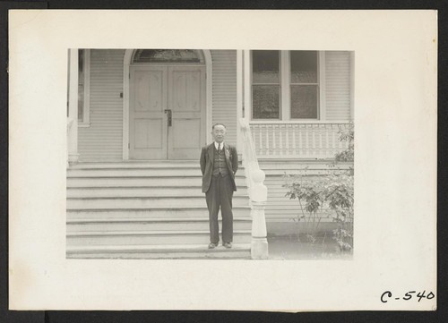 Florin, Calif.--Rev. Naito (Buddhist) on steps of his church prior to evacuation. Photographer: Lange, Dorothea Florin, California