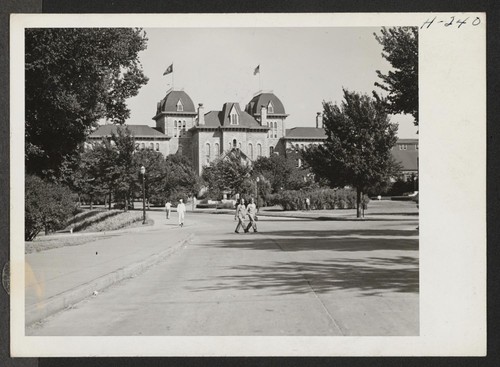 Scene on the campus at Kansas State University at Lawrence, Kansas. Photographer: Mace, Charles E. Lawrence, Kansas