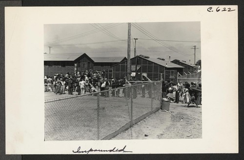 Supper time! Meal times are the big events of the day within an assembly center. This is a line-up of