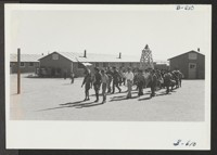 Evacuees staging a Boy Scout Memorial Day Service on May 30. Photographer: McClelland, Joe Amache, Colorado