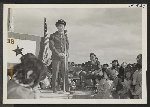 Sgt. Ben Kuroki responding to a speech of welcome given by Project Director Guy Robertson and representatives of the Community Council upon his arrival at Heart Mountain. Photographer: Aoyama, Bud Heart Mountain, Wyoming