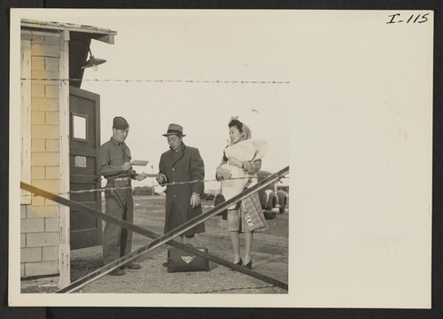 Mr. and Mrs. Thomas Oki and baby Dinne give their indefinite leave passes to Pfc. Courtland Dalheim of the Military