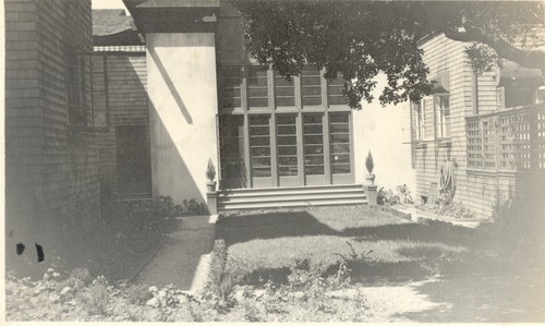 Rear Court of Faculty Club, May 1916 (showing young planting)