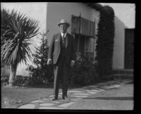 Former District Attorney Asa Keyes, at home on the day of his parole from prison, Beverly Hills, 1931