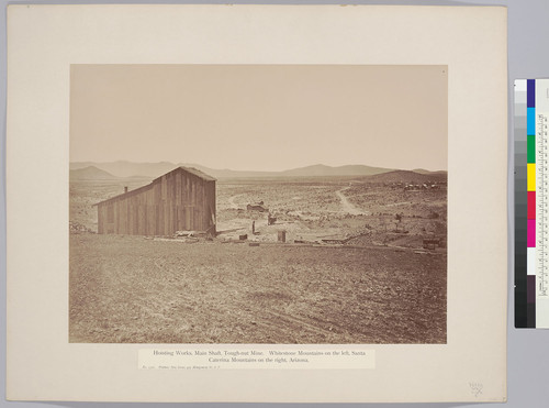 Hoisting Works, Main Shaft, Tough-nut Mine. Whitestone Mountains on the left, Santa Caterina Mountains on the right, Arizona