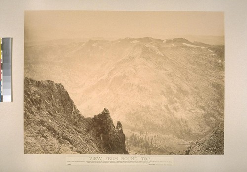 View from Round Top. From a point just below Azimuth. Stanislaus Mountain toward Mt. Dana in left background. Mokelumne Mountain in distance over the cleft in the foreground. Three Brothers in the distance over the sharp, higher pinnacle to right cleft in foreground. Mokelumne Canon (2800 ft. high) winding from middle distance to foreground