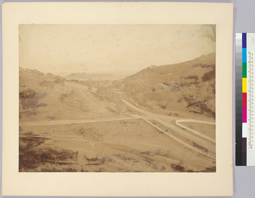 [Unidentified Road: "Gas works and valley, W.C. Ralston's" (title from the similar stereograph.)]