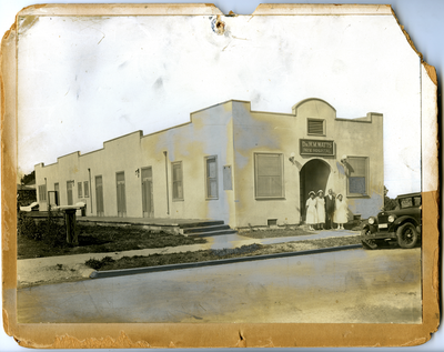 Dr. William Watts and three nurses standing in front of W.M. Watt’s Private Hospital, Oakland, California