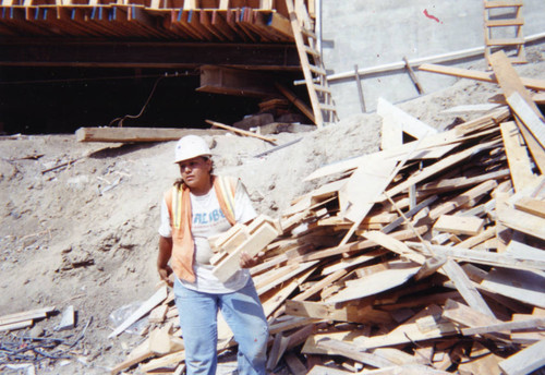 A carpenter at a construction site