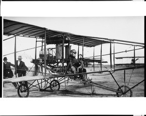 Elmer Cook at the controls of a Curtiss biplane at the Dominguez Hills Air Meet, 1912