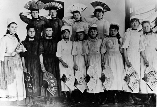 Young girls with fans