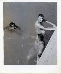 Soldiers in a swimming in a pool