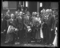 Prince Takamatsu, his wife, and their entourage posing at Los Angeles, Calif. train station in 1931