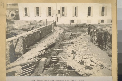 San Francisco Earthquake and Fire, 1906. Removing basement floors bulged by the earthquake