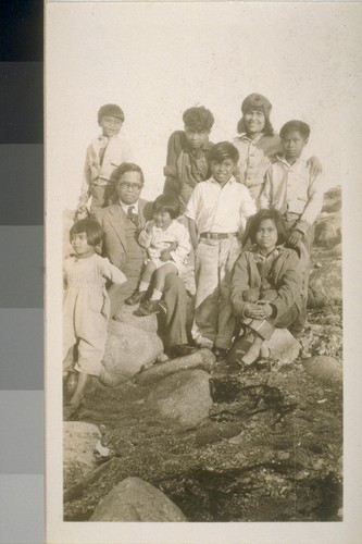 Snapshots of unidentified individuals and groups