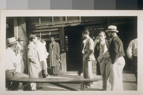 Snapshots of Filipinos in front of buildings: In front of a building number 1207 [3rd Street, Sacramento ?]