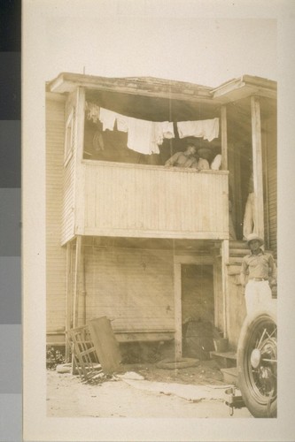 Snapshots of laborers and buildings, location unknown