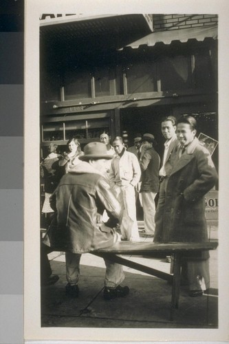 Snapshots of Filipinos in front of buildings: In front of a building number 1207 [3rd Street, Sacramento?]