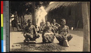 Women preparing grain outdoors, Congo, ca.1920-1940